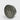 Black and white striped spherical object on a light gray background